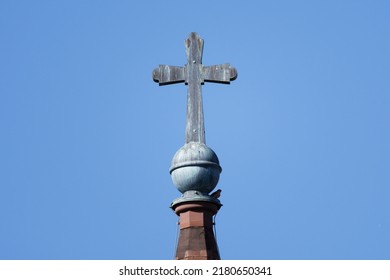 Cross On The Spire Of A Protestant Church In Cologne