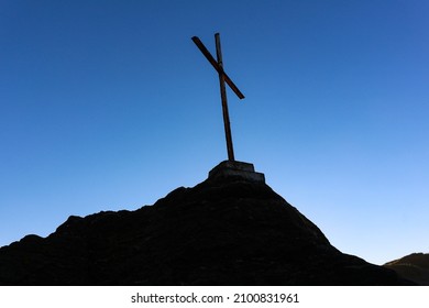 Cross On Top Of A Rock Mound