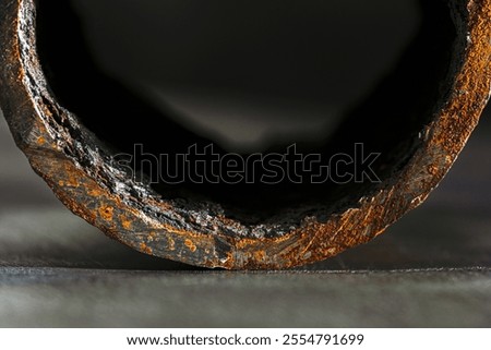 Cross section old corroded pipe, steel scrap, macro view