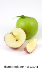 Cross section of red apple and a green apple with leaf - Shutterstock ID 18576241