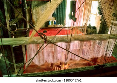 Cross Section Of A Silk Weaving Machine (textile Industry) With The Threads Attached Taken In The Silk Weaving Town Of Sualkuchi, Assam,India