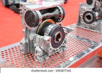 cross section of worm gear pump the equipment that uses the meshing of gears to pump fluid by displacement ; close up ; industrial background 