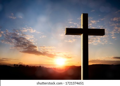 Cross at sunset, crucifixion of Jesus Christ - Shutterstock ID 1721374651