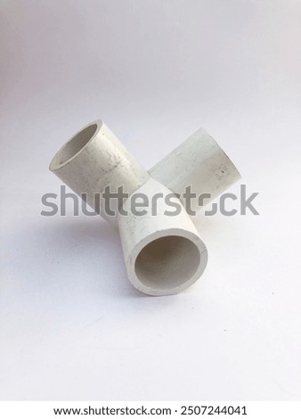 cross tee pipe fitting to divide water flow into three isolated on white background