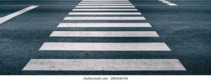 cross walk on the road for safety when people walking cross the street, Pedestrian crossing on repaired asphalt road, Crosswalk on the street for safety, logistic import export and transport industry