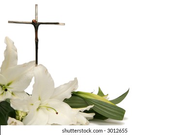 Cross and white easter lilies on a white background