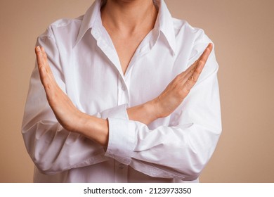 Crossed hands. Break the bias symbol of woman's international day. Woman arms crossed to show solidarity, commitment to calling out bias, breaking stereotypes, inequality, rejecting discrimination - Shutterstock ID 2123973350