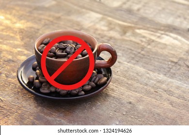 Crossed Out Coffee Cup With Coffee Beans, No Coffee Allowed