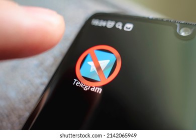 A crossed-out icon on a black smartphone screen. the concept of banning the application telegram. April 1, 2022. Barnaul. Russia