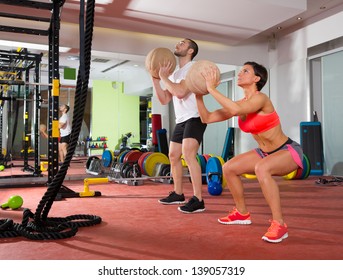 Crossfit Ball Fitness Workout Group Woman And Man At Gym