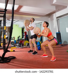 Crossfit Ball Fitness Workout Group Woman And Man At Gym