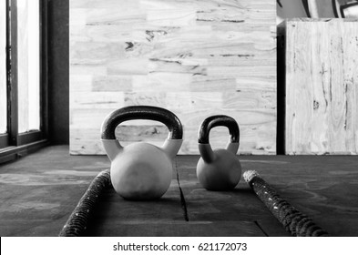 Crossfit equipment kettlebell and battle rope black and white