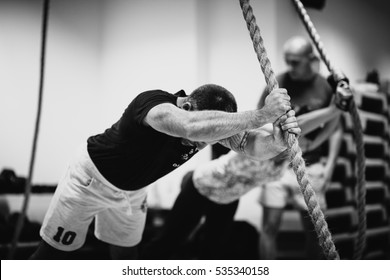 crossfit group training. Man and woman group training indoors. Black and white - Powered by Shutterstock