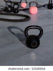 Crossfit Kettlebells Ropes  In Fitness Gym Floor