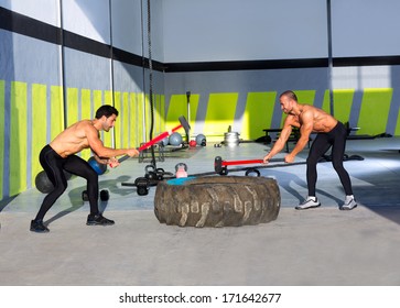 Crossfit Sledge Hammer Men Workout At Gym