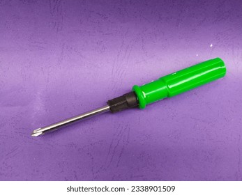 Crosshead screwdriver on purple background