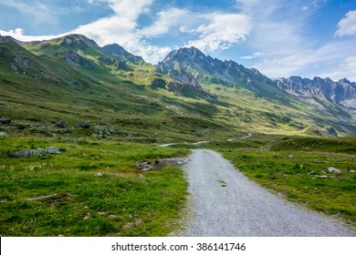 Crossing the Alps. Biking in the Alps. 