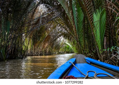 Crossing A Canal At My Tho (Mekong River Delta), Vietnam, In A Row Boat