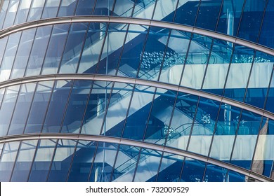 Crossing Escalators In A Glass Modern Building. Business Concept