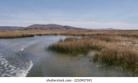 Crossing Lake Titicaca On A Small Boat, In Broad Daylight, With Miles Of Reeds On The Horizon, As Far As The Eye Can See, Path And Navigation