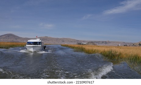 Crossing Lake Titicaca On A Small Boat, In Broad Daylight, With Miles Of Reeds On The Horizon, As Far As The Eye Can See, Path And Navigation