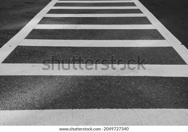Crossing lines on the\
street black and white