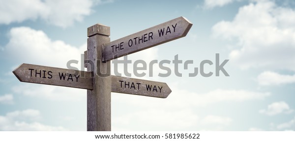 Crossroad signpost saying this\
way, that way, the other way concept for lost, confusion or\
decisions