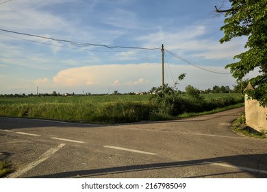 Crossroads In The Countryside At Sunset