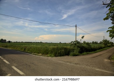 Crossroads In The Countryside At Sunset