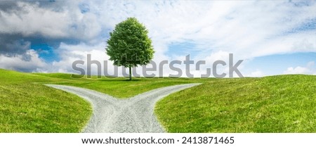 Crossroads on a path through a hilly landscape