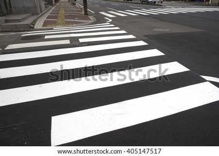 Similar – Road crossing with wide crosswalk in the USA