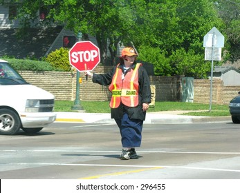 Crosswalk Guard Holding Stop Sign