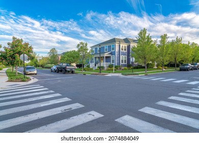 Crosswalk at the intersection road in a residential area at Daybreak, Utah