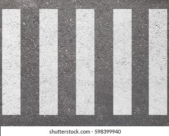 crosswalk on the road for safety when people walking cross the street.