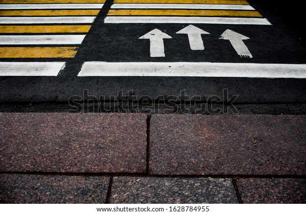 crosswalk on the road\
for safety when people walking cross the street, Crosswalk on the\
street for safety