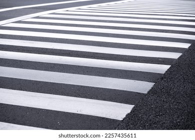 Crosswalk of  pedestrian road background with black color. - Shutterstock ID 2257435611