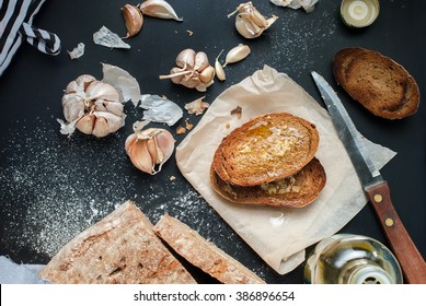 Crostini Olive Oil Garlic Toasted Bread Top View Black Background