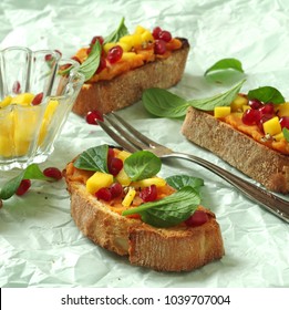 Crostini With Sweet Potato Puree, Mango, Chinese Baby Spinach And Pomegranate