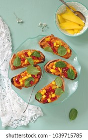 Crostini With Sweet Potato Puree, Mango, Chinese Baby Spinach And Pomegranate