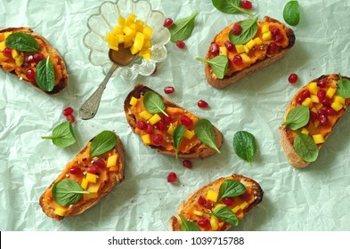 Crostini With Sweet Potato Puree, Mango, Chinese Baby Spinach And Pomegranate