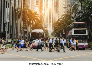 Crow Of People Walking On Zebra Crossing And Traffic Jam On Cross Street In Singapore.