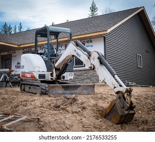 CROW WING CO, MN - 5 MAY 2022: Used Bobcat Excavator On Job Site.