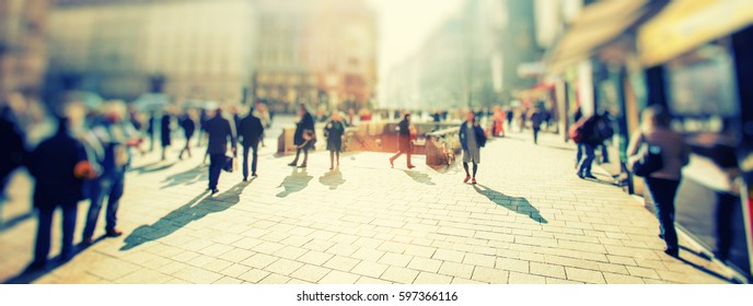 Crowd Of Anonymous People Walking On Busy City Street