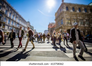 Crowd Of Anonymous People Walking On Busy City Street