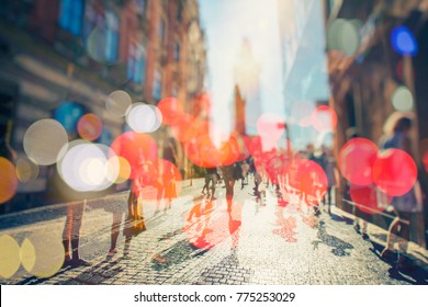 Crowd Of Anonymous People Walking On Busy City Street