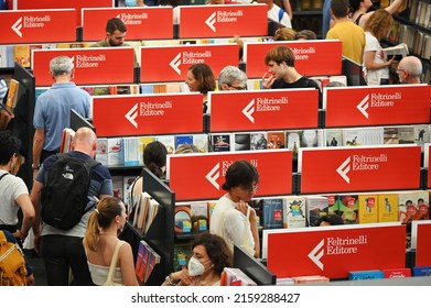 Crowd Of Audience At Feltrinelli Italian Publishing House Booth At International Book Fair Turin Italy May 22 2022 Narrow Focus Field Deliberated Motion Blur