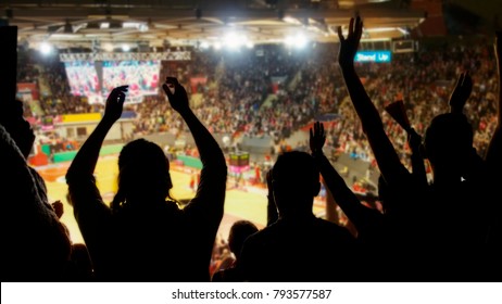 Crowd Cheering At Basketball Stadium