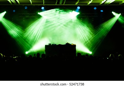 Crowd At Concert Looking On Empty Stage