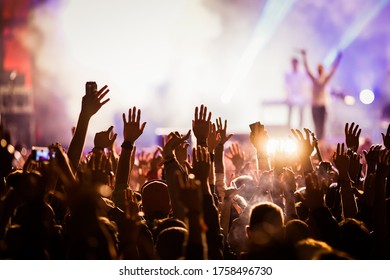 crowd at concert summer music festival - Shutterstock ID 1758496730