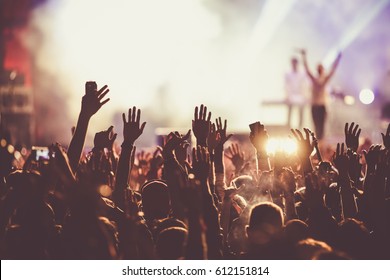 crowd at concert - summer music festival - Shutterstock ID 612151814